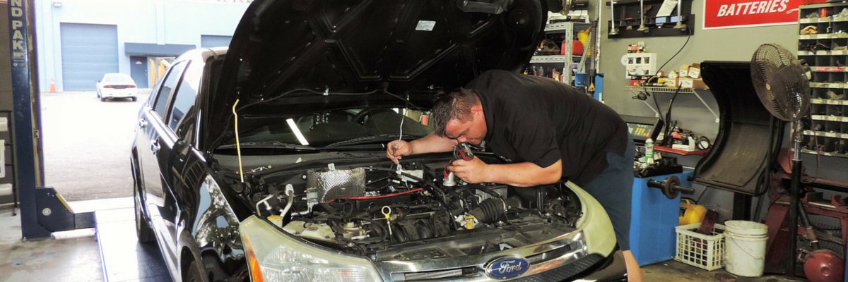 Brandee working under the hood